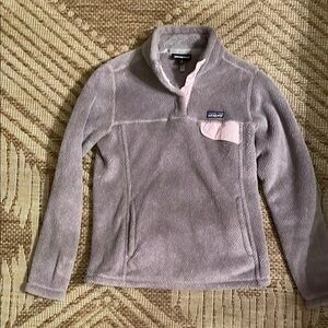 A beautiful lavender fleece pullover in perfect used condition.